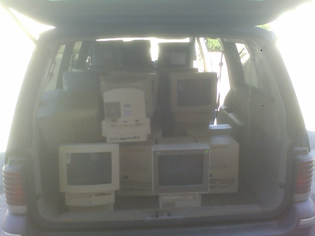 Selling monitors out the back of the van.jpg